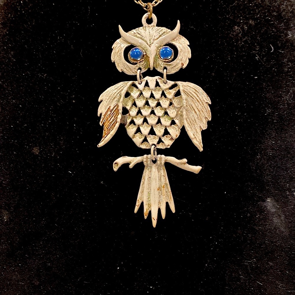 Beautiful White Articulated Owl Pendant with Icy Blue Eyes. Gold Tone Chain.